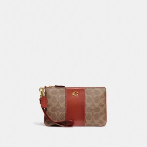 Coach Small Wristlet In Signature Canvas Marroni Rosse | COH865645